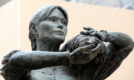 Carla Bruni-Sarkozy dressed in workwear